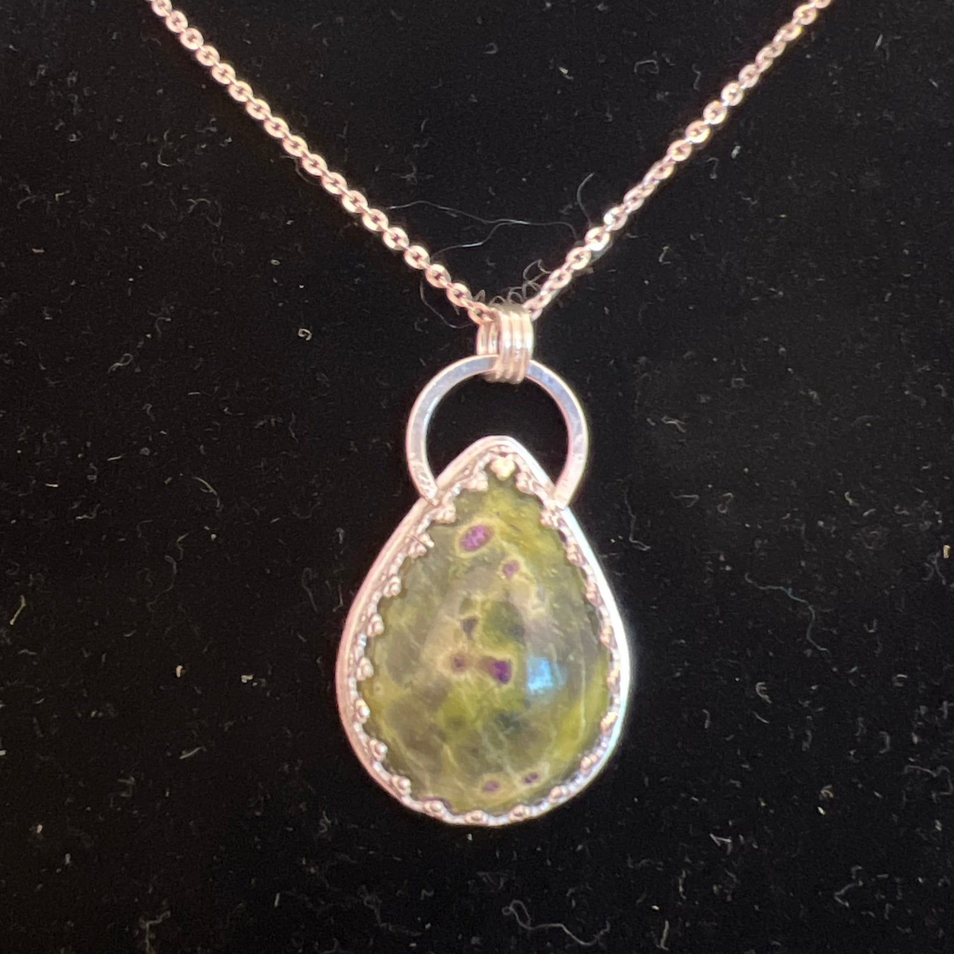 Teardrop stichtite sterling silver pendant on 20" sterling silver chain