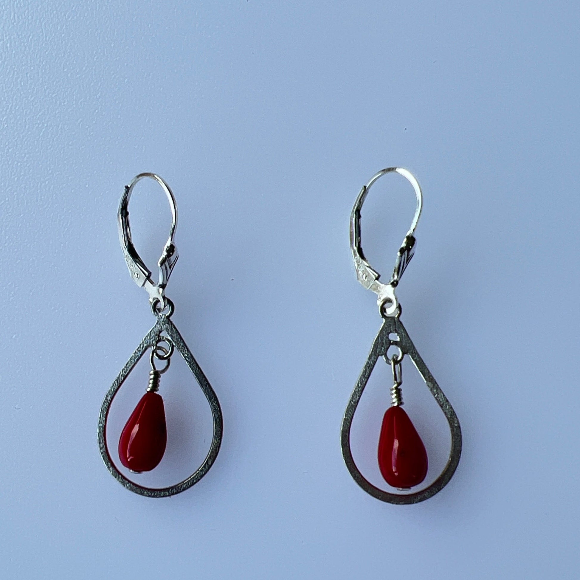 Sterling silver pear shape with teardrop red coral dangle earrings