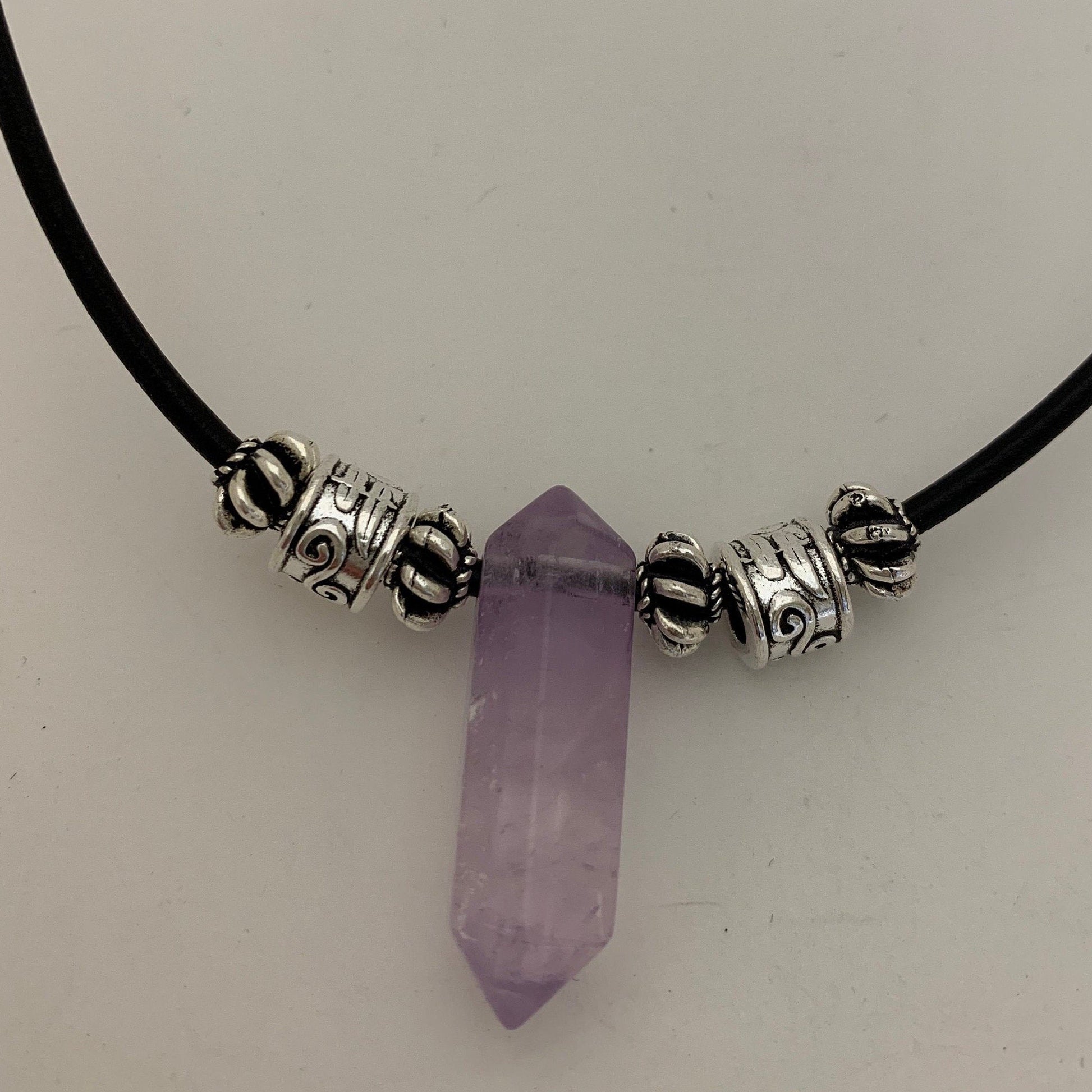 Amethyst tube with Tibetan beads on leather chain 