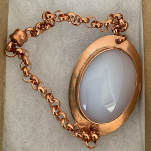 Big oval white Agate cabacon incase in  copper joined rolo copper chain with copper magnetic
