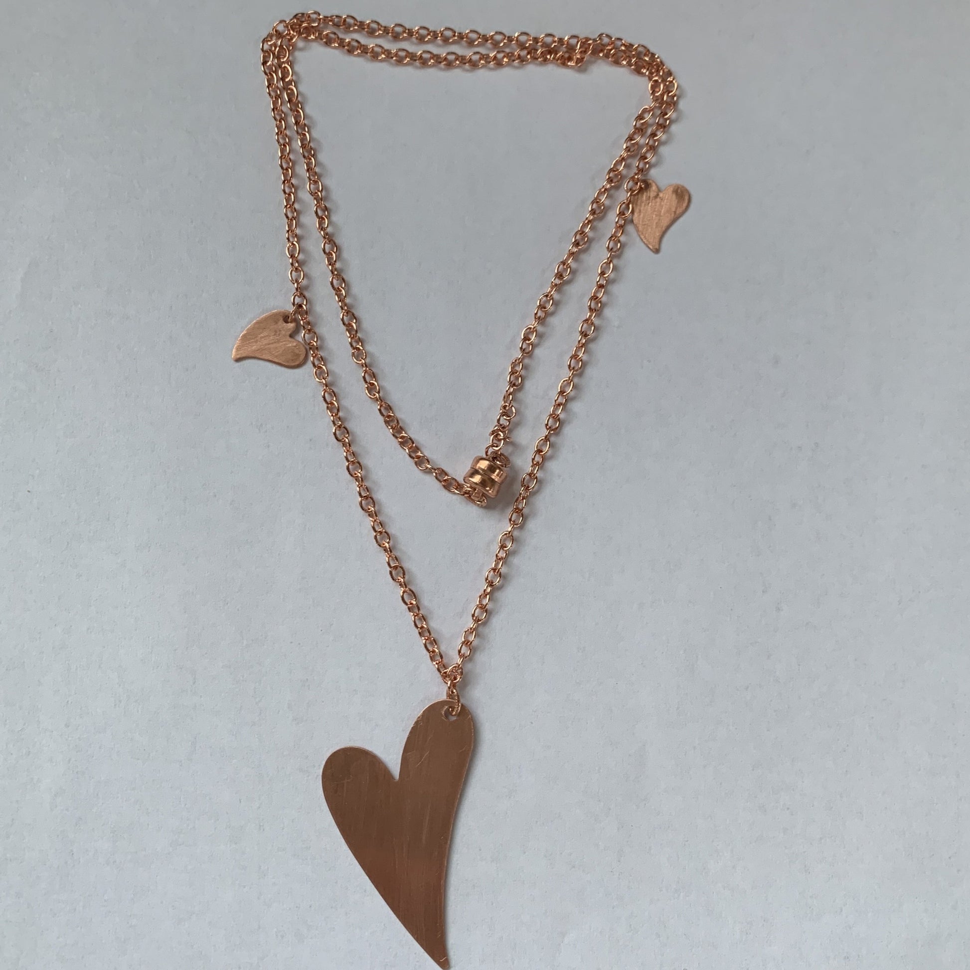 Copper hearts on copper chain with copper magnet
