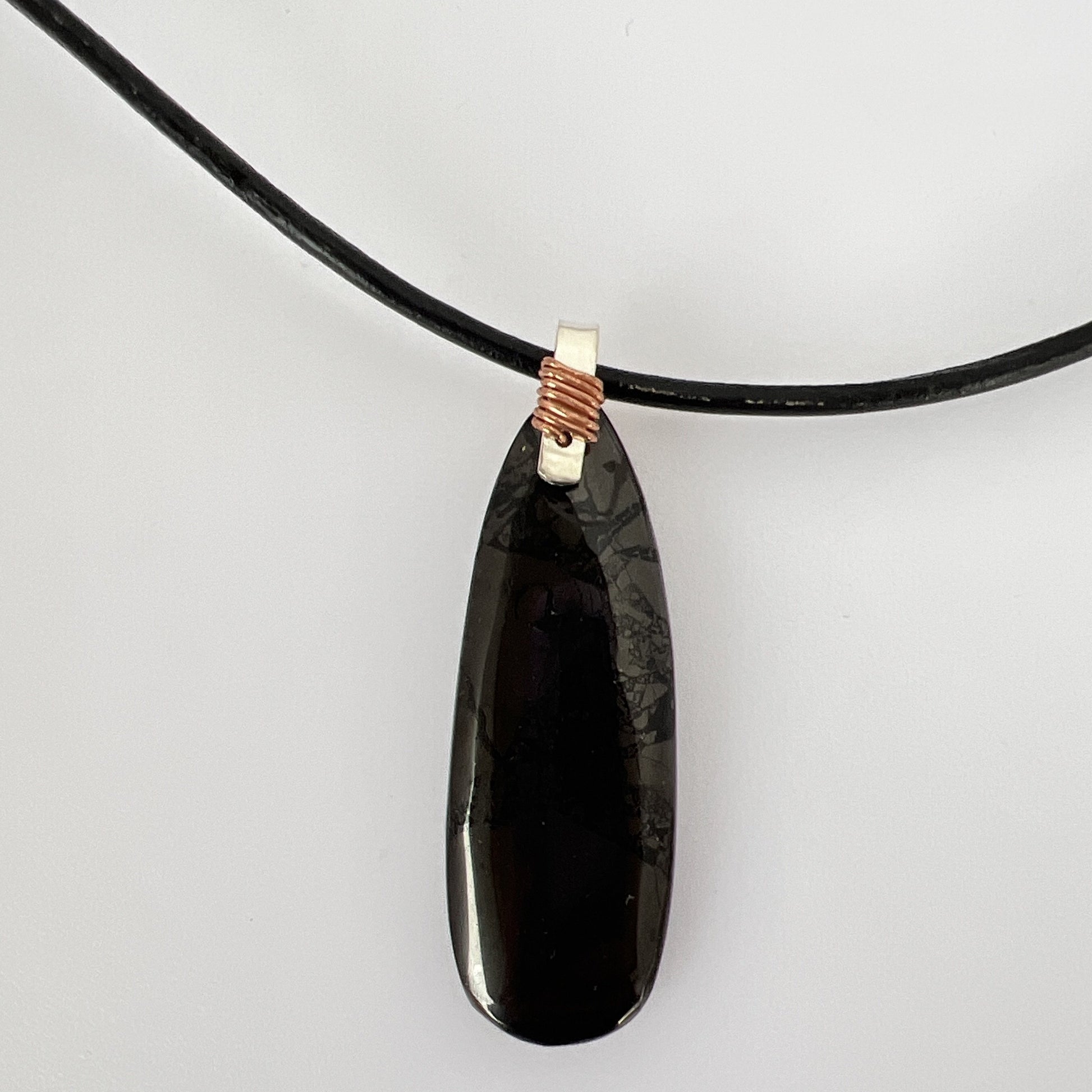 Natural Russian Shungite pendant on sterling silver hand wrapped with copper wire on 22" real leather cord