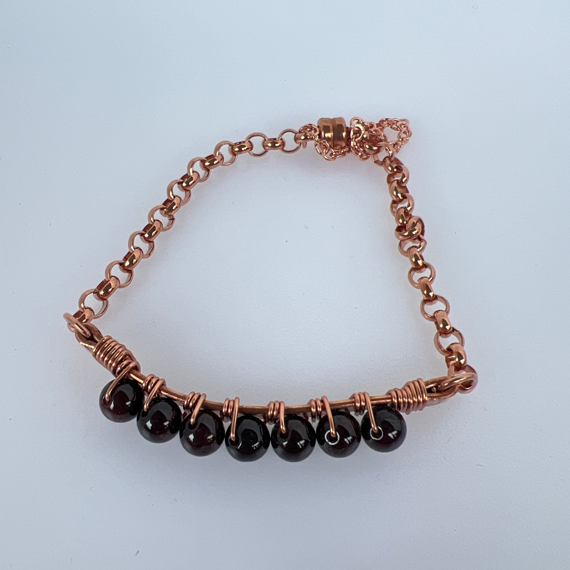 6mm red garnet wire wrapped on copper plated and copper rolo chain finished up with copper magnet