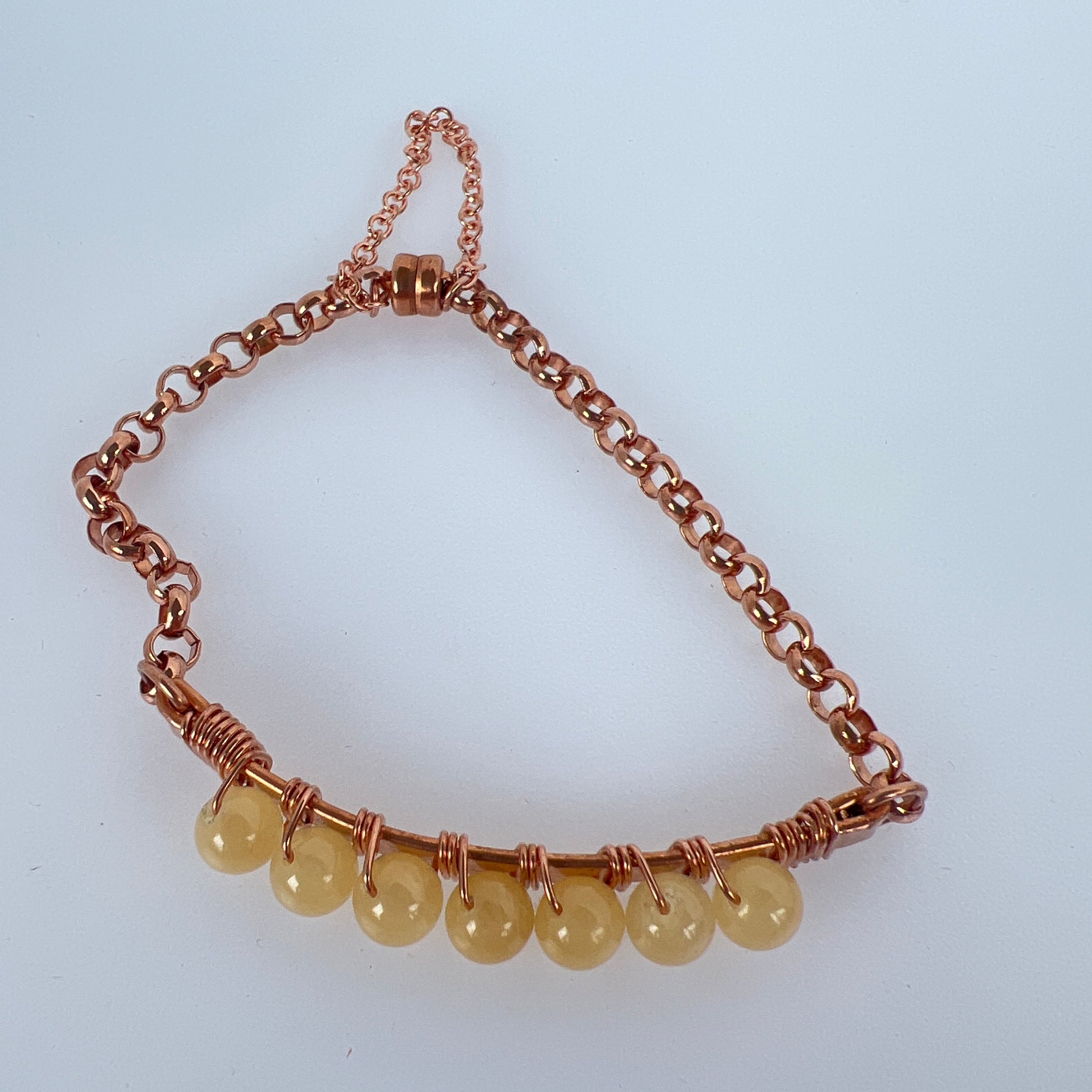 6mm yellow jade wire wrapped on copper plated and copper rolo chain finished up with copper magnet